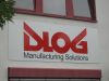 Firmenschild von DloG in München 
Weißes Dibond Schild mit roter und schwarzer Folie beklebt
Von 089 Werbung in München und in Dachau